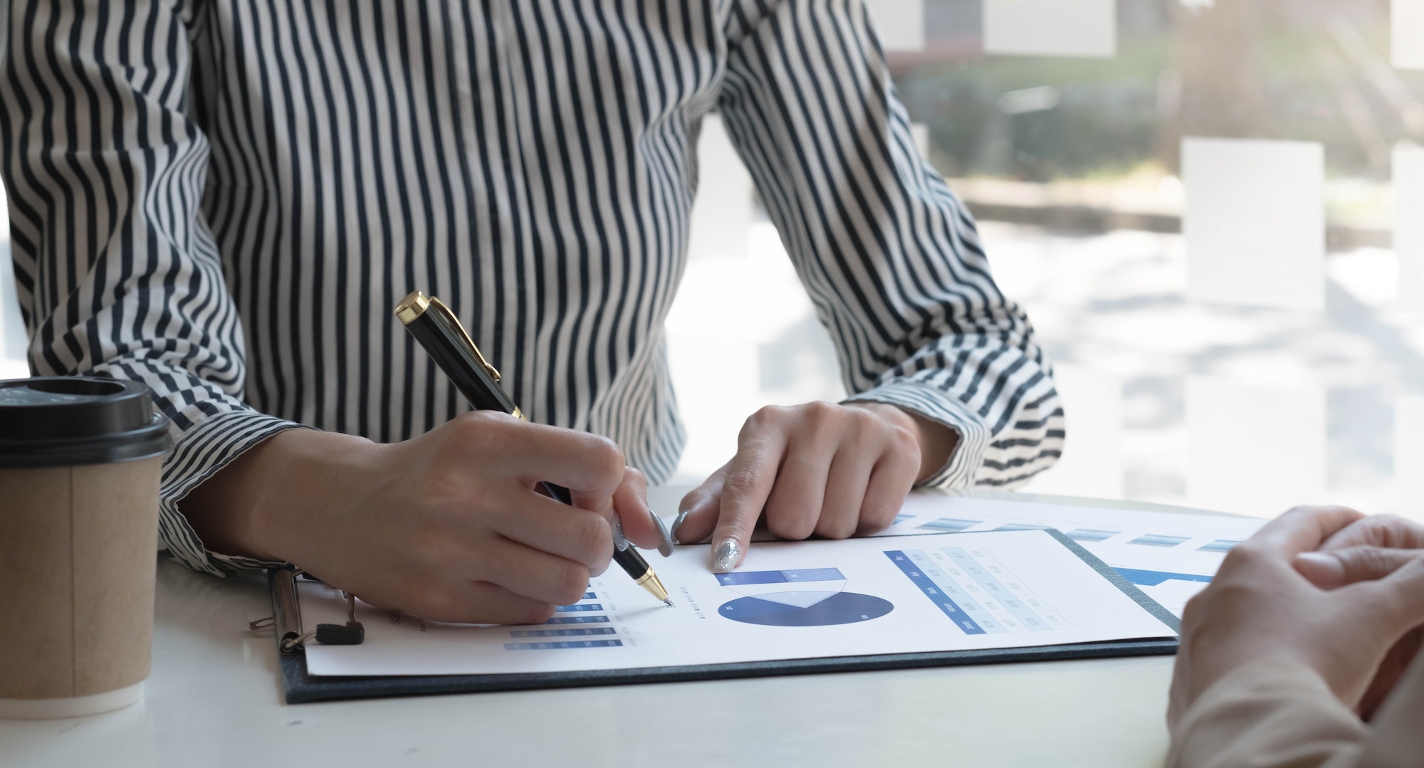 Team of business people working together in the meeting room office, teamwork background charts and