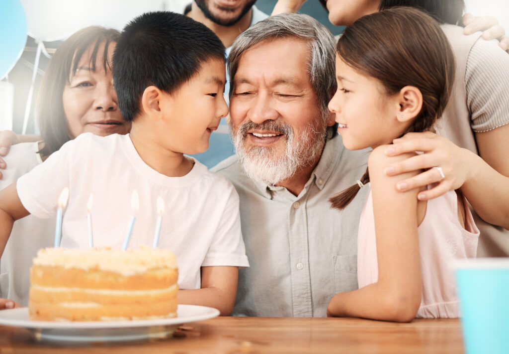 The old believe everything. Shot of a happy family celebrating a birthday at home.