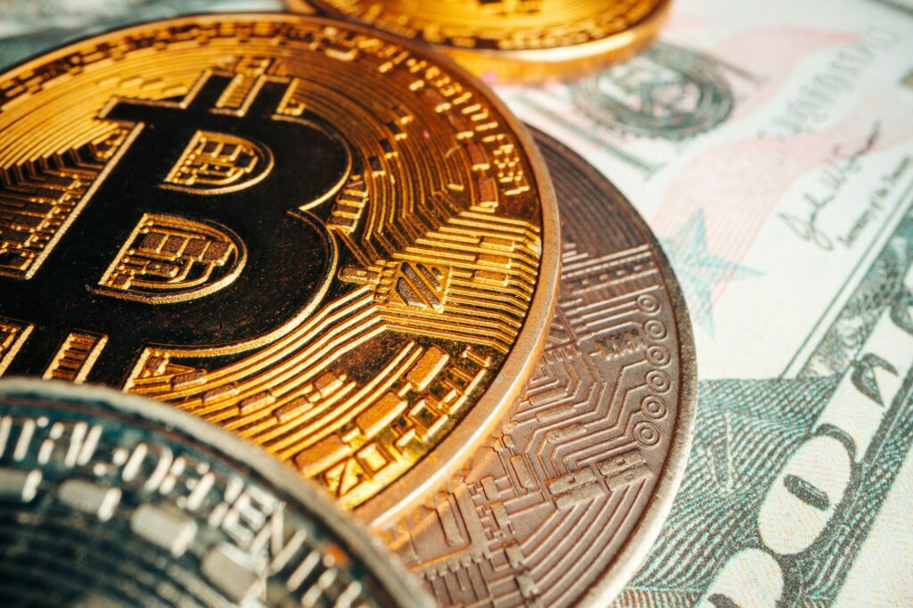 Bitcoin on american dollar banknote close up